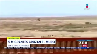 VIDEO: Migrantes cruzan el muro con ayuda de "polleros" | Noticias con Francisco Zea