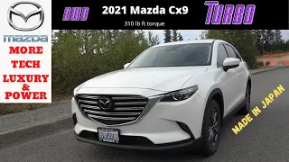 2021 Mazda CX9 Touring premium package Review , interior tour infotainment features and test drive.