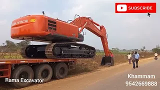 TATA HITACHI Zx370 Gi Unloading from trailer,