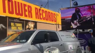 Elton John performing Tiny Dancer at the former Tower Records location.