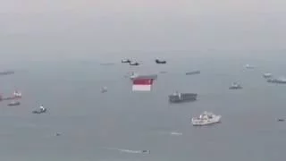 Helicopter flypast.  National Day Singapore.