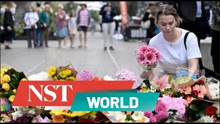 Australia PM lays floral tribute for those killed at Sydney shopping centre