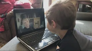 Special ed teacher connecting virtually with students