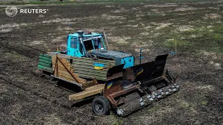 This Ukraine farmer is removing mines with a remote-controlled tractor