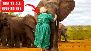 Heartwarming Reason Why These Elephants Form a Line to HUG This Woman