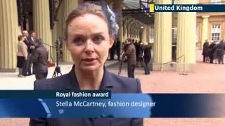 Stella McCartney honoured with OBE by Queen Elizabeth at Buckingham Palace ceremony