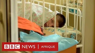 Les orphelinats d'Ukraine : Des enfants attachés et des hommes dans des lits de camp