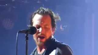 Eddie Vedder stops his performance to kick a fan out of the stadium