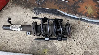 How to: Replace front coil spring and top strut mount on a Ford Fiesta (2002-2008)