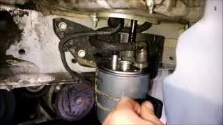 How to change fuel (diesel) filter on Renault Laguna MK3 2.0 dci. Как поменять топливный фильтр.