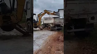OZ Retro escavadeira CAT Liimpando caixote de carbureto