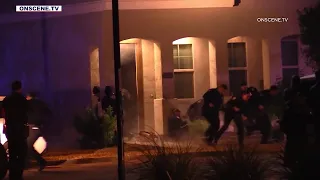 9 Phoenix police officers hurt during shooting at south Phoenix home; suspect and woman dead