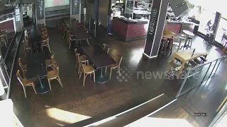 Raw CCTV footage of New Zealand bartender hilariously dropping a tray holding several pints of beer