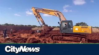 Libya flooding victims buried in mass graves