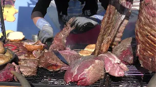 Italy Street Food Fair. Grilled Meat, Burgers, Ribs, Pork Legs, Fried Food and More