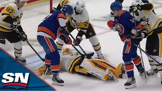 Islanders' Anders Lee Puts Home Backhand Off Casey DeSmith's Torso For Bizarre Goal