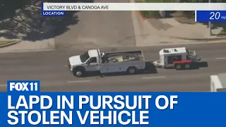 LAPD in pursuit of suspected stolen vehicle in the San Fernando Valley