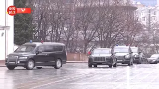 Chinese President Xi and his motorcade arrive at the House of the Russian Government