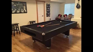 Assembly of a pool table with slates.