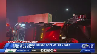 Truck driver uninjured as train strikes tractor-trailer in Powell