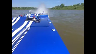 Twin 50 Inch Cat tearing up some water