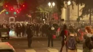 Medics help injured protester in Portland