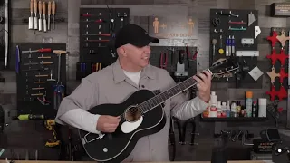 Checking Out A Rubber Bridge Guitar