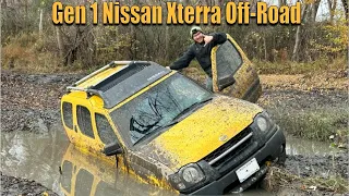 Gen 1 Nissan Xterra Off-Road in Deep Mud