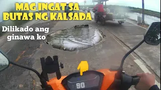 Sumimplang sa butas na kalsada