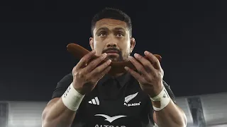 Australia present the All Blacks with a boomerang during the Haka
