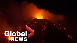 Italy's Mount Etna erupts, causing spectacular nighttime explosions