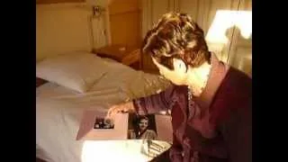 mother showing her photo album