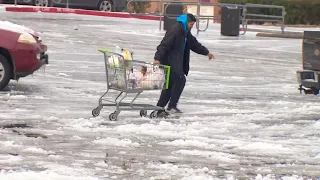 Open grocery stores hard to find, residents reluctantly hit the icy streets