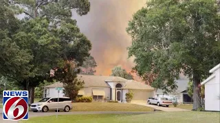 Homes evacuated after large brush fire starts at Space Force annex in Palm Bay