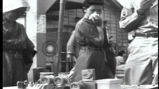 US soldiers and Japanese civilians in Tokyo, Japan, during American occupation af...HD Stock Footage