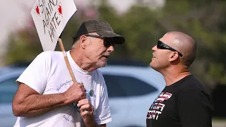 Protesters demonstrate outside hotel as Sheriff Mims receives award inside