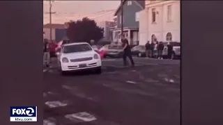 Man frustrated by Oakland sideshow gets attacked by crowd