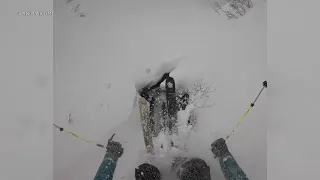 Skier falls into hidden waterfall, GoPro video shows