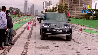 President Uhuru Kenyatta drives Range Rover on Nairobi Expressway
