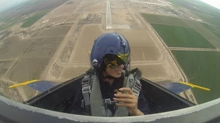 Female first gets ride with Blue Angels