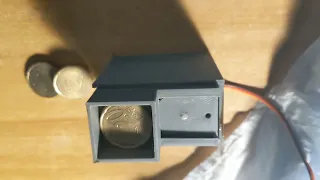 Mecanismo para pagar monedas de 20 céntimos