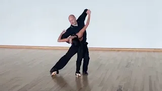 Andrew Sinkinson dancing foxtrot with Anastasia Milyutina