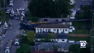 Residents displaced after large crane crashes into Miami-Dade apartment building