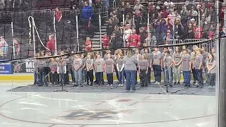 Metamora Grade School Chorus sing the National Anthem at the Peoria Rivermen Game