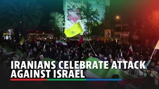 Iranians celebrate attack against Israel, launching fireworks and waving flares | ABS CBN News