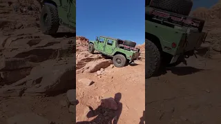 Humvee Climbing Big Ledges on Cliff Hanger in Moab