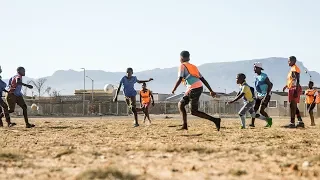 Playing soccer with Kids to save them