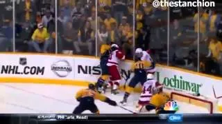 Shea Weber smashes Zetterbergs head into the glass.