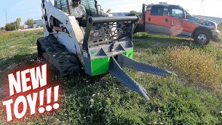 Another awesome skid loader attachment!