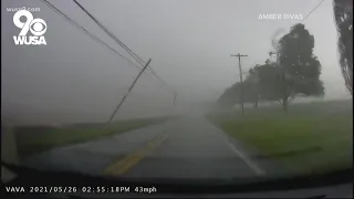 Power lines nearly fall on car during strong storms